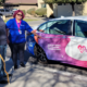 Wanda driver holding the car door open for passenger